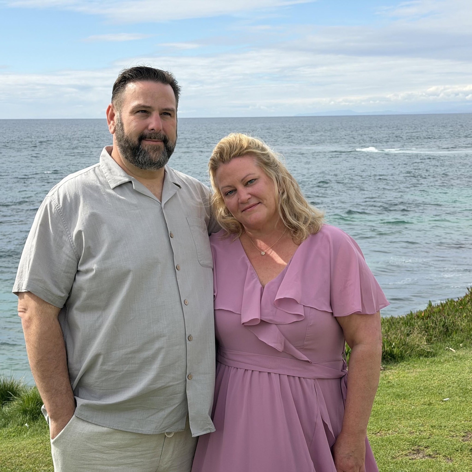 Mike and Amy Ward together by the ocean